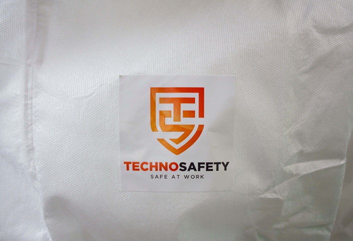 Technosafety wegwerp overall, Cat III, Type 4/5/6, Wit met oranje seal, Anti-statisch, Maat XL